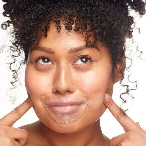 Woman wearing clear lip gel mask, highlighting hydrating treatment for smoother, plumper lips