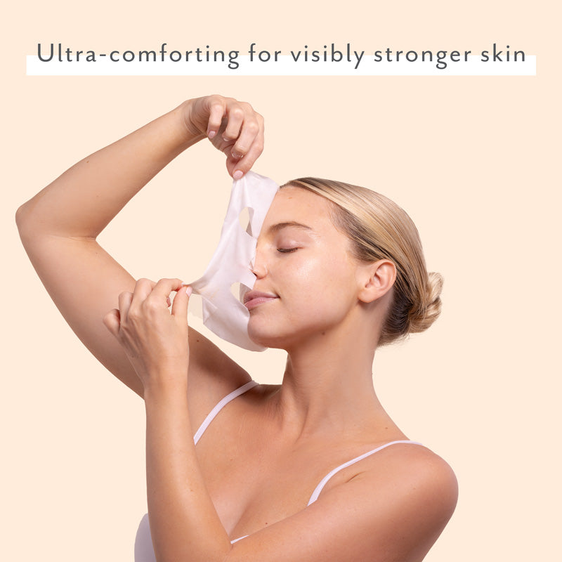woman wearing sheet mask ultra-comforting for visibly stronger skin sensitive skincare