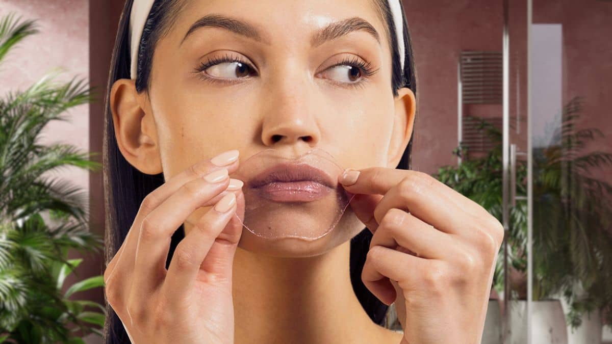 woman applying hydrating lip gels