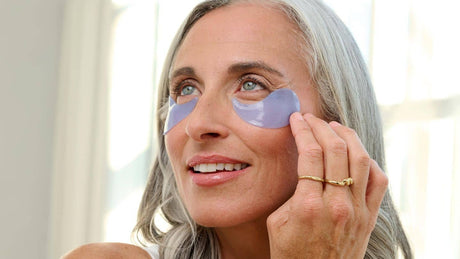 woman using on ice eye masks to depuff and smooth dry undereyes