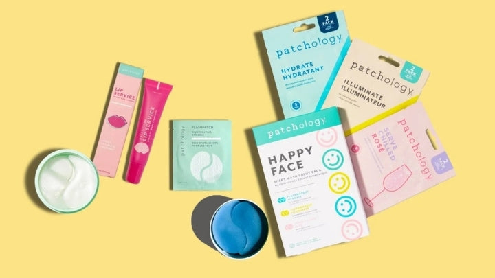 A flat lay of various Patchology skincare products, including eye gels, sheet masks, and lip gloss, on a bright yellow background