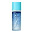 A bottle of Good Day Crystal Clear Refreshing Mineral Micra Mist, featuring a light blue cap and a blue-to-clear gradient bottle, centered on a solid green background.