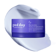 Purple jar of Five-to-Nine Dreamy Overnight Recovery Balm displayed over a pale lavender cream swatch.