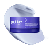 Purple jar of Five-to-Nine Dreamy Overnight Recovery Balm displayed over a pale lavender cream swatch.