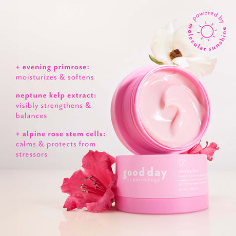 Open jar of Nine-to-Five Instant Wake-Up Morning Gel-Cream with flowers, highlighting evening primrose, Neptune kelp extract, and alpine rose stem cells.