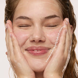 woman using juice cleanse with double cleanse makeup remover